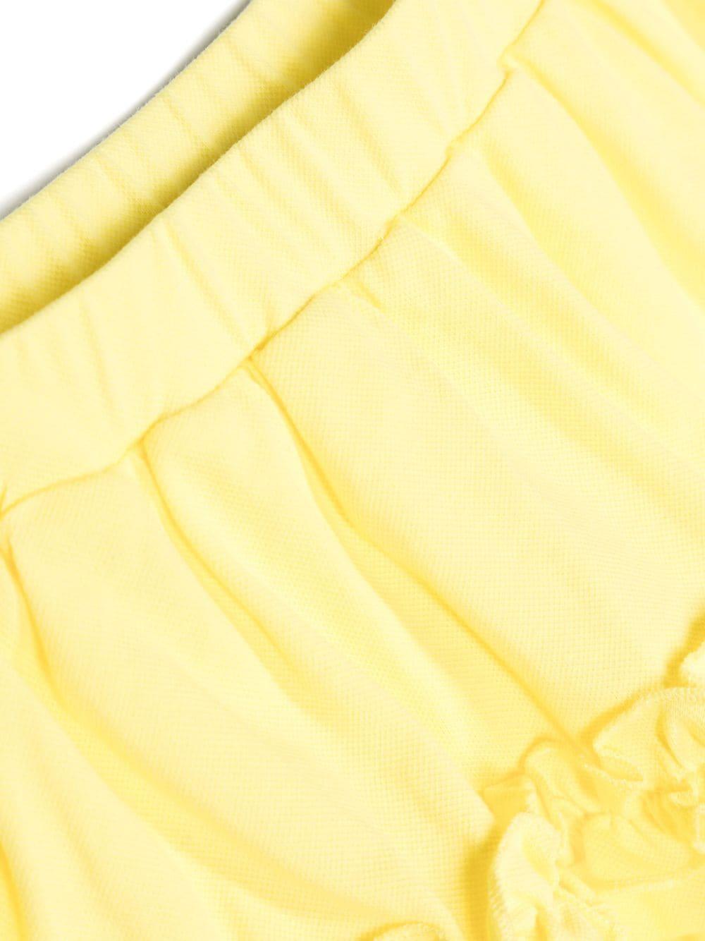 White and yellow sports outfit for girls