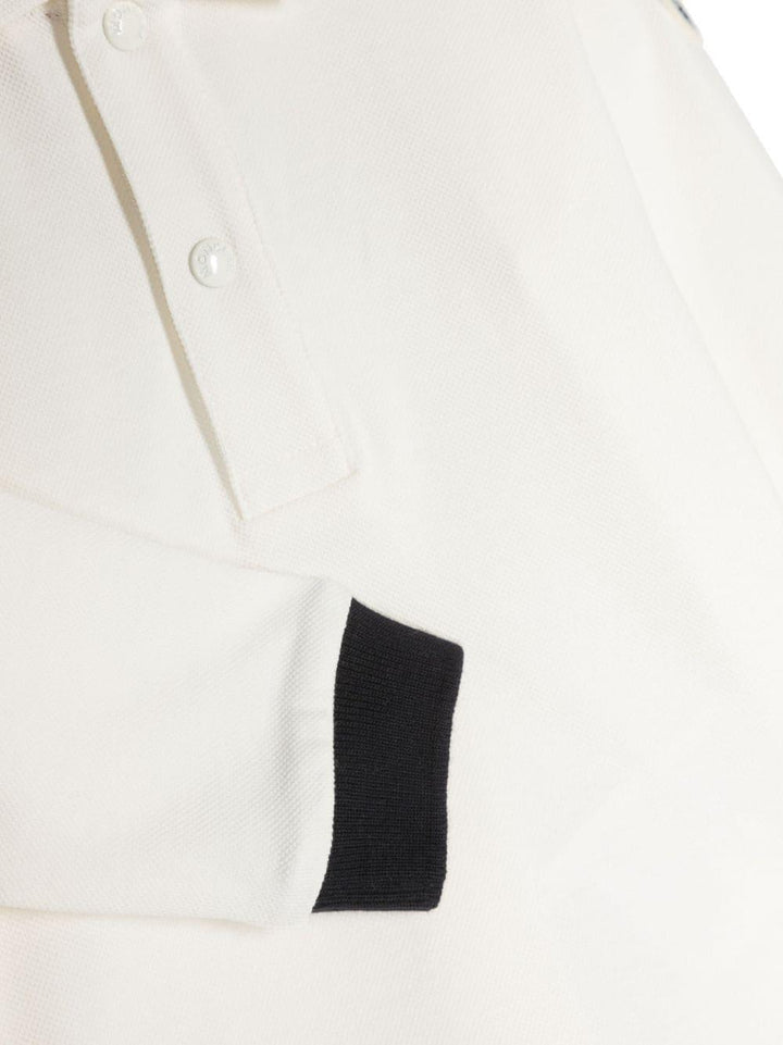 White polo shirt for newborns with logo