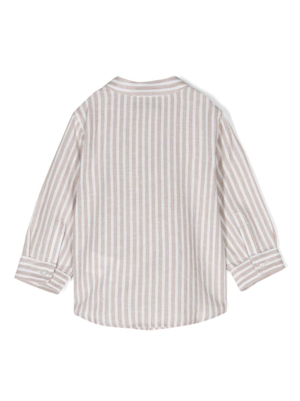 Beige and white shirt for newborns with logo
