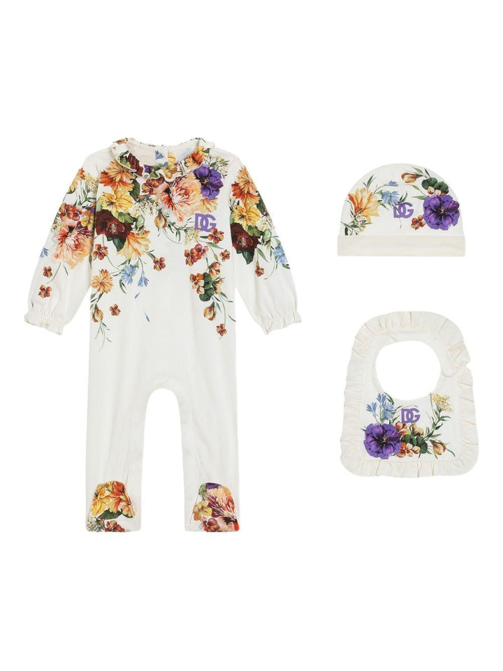 Tutina bianca con fiori per neonata