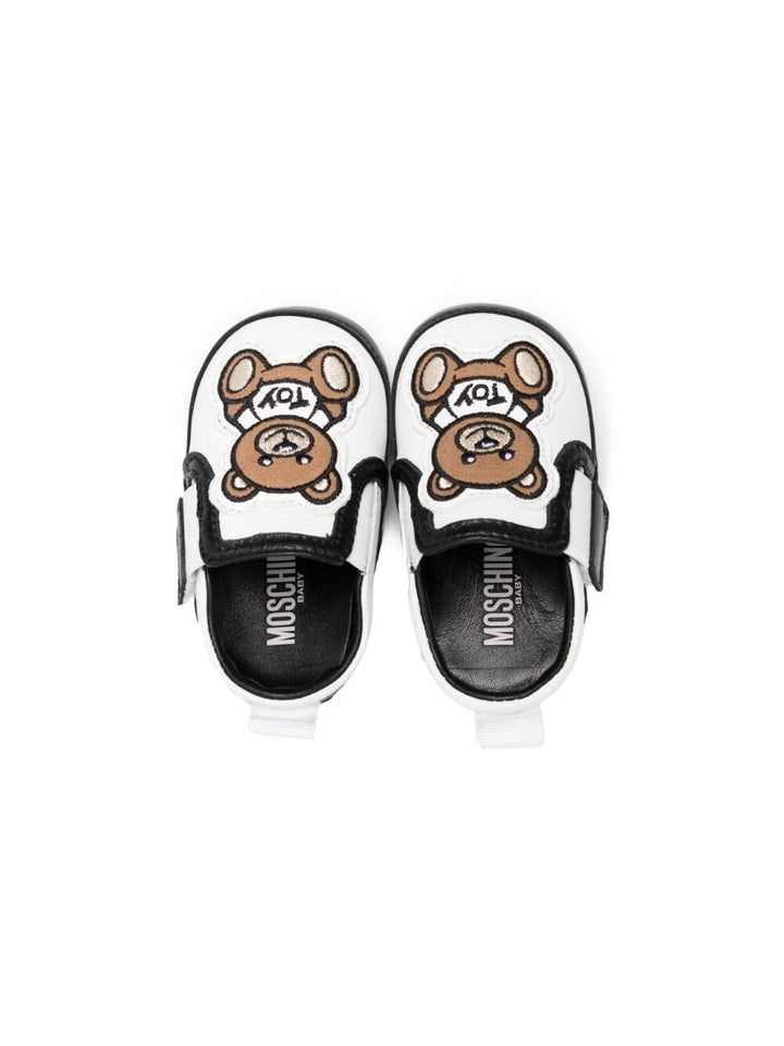 Sneakers bianche e nero per neonati 74266 1 Moschino Kids 