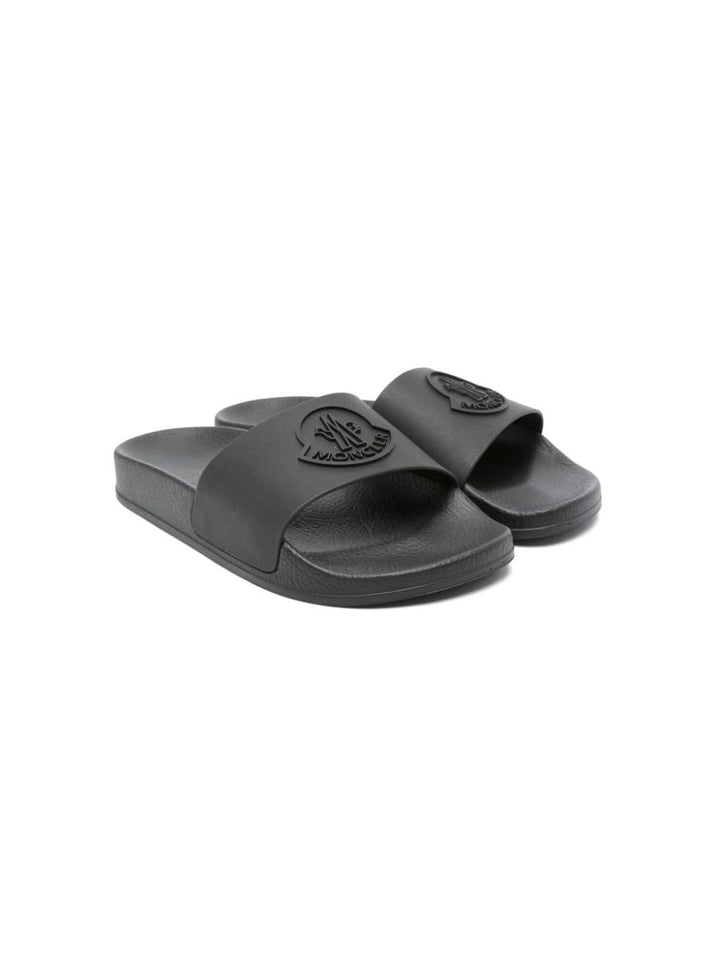 Black children's slippers with logo