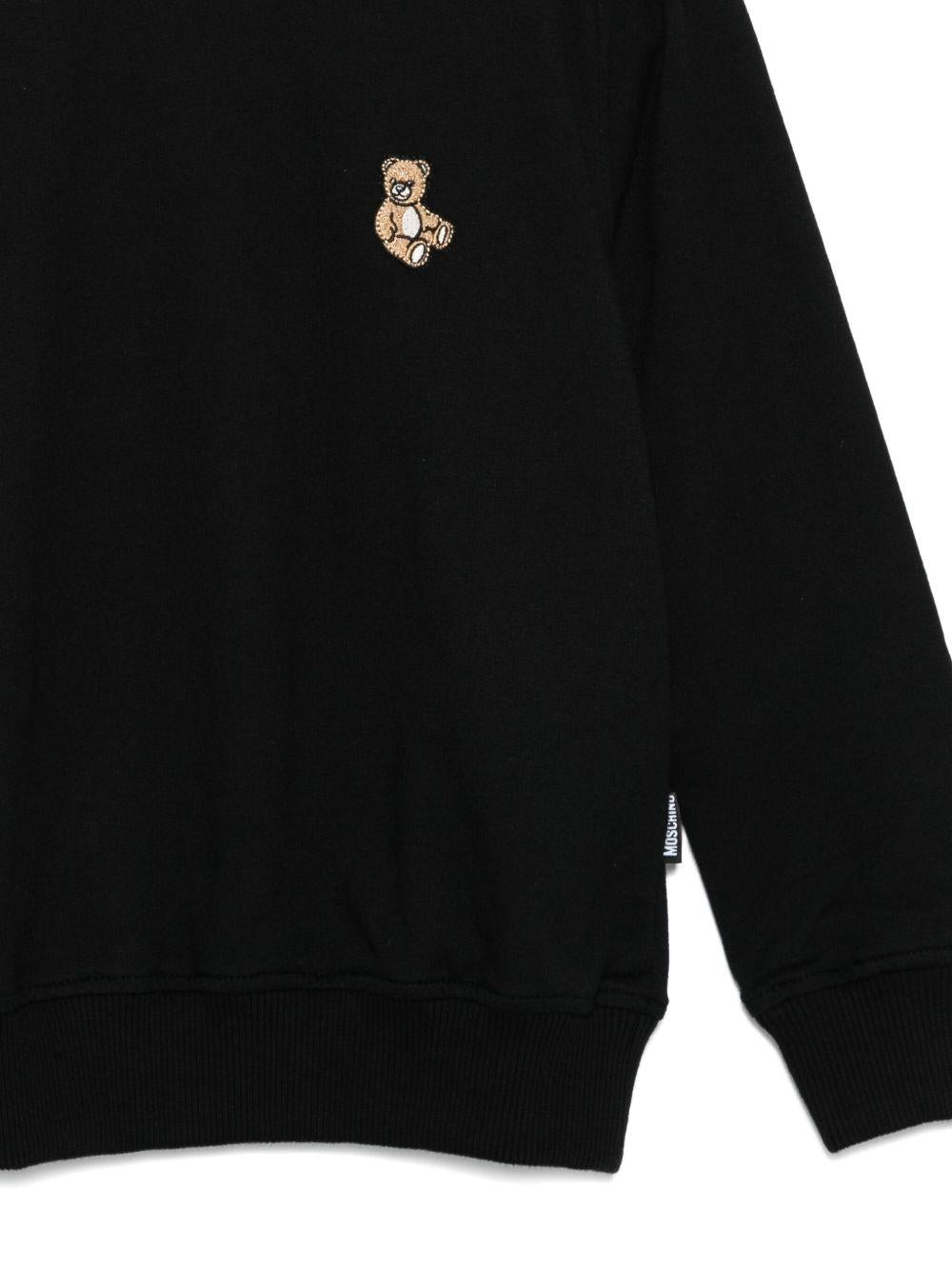 Maglione nero per bambino HRF08VLCA40 60100 Moschino Kids 
