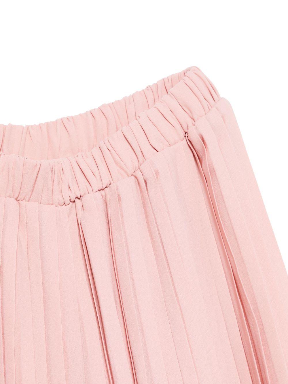 Tuta rosa cipria per bambina