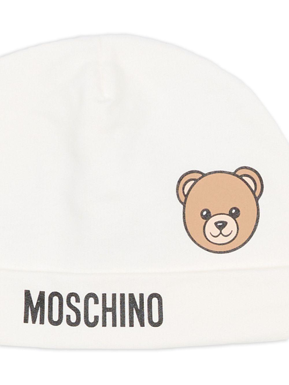 Cappello bianco per neonato MUX05ULCA19 10063 Moschino Kids 