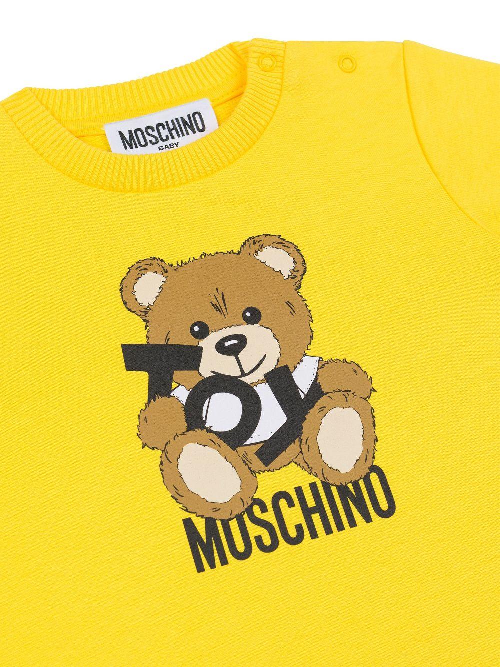 Abito giallo canarino per neonata