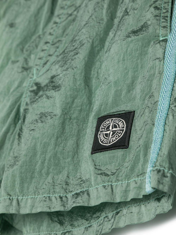 Green costume for boys with logo