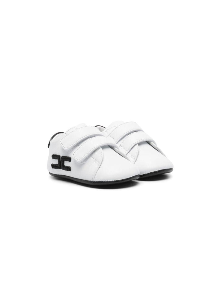 White sneakers for baby girls with black logo