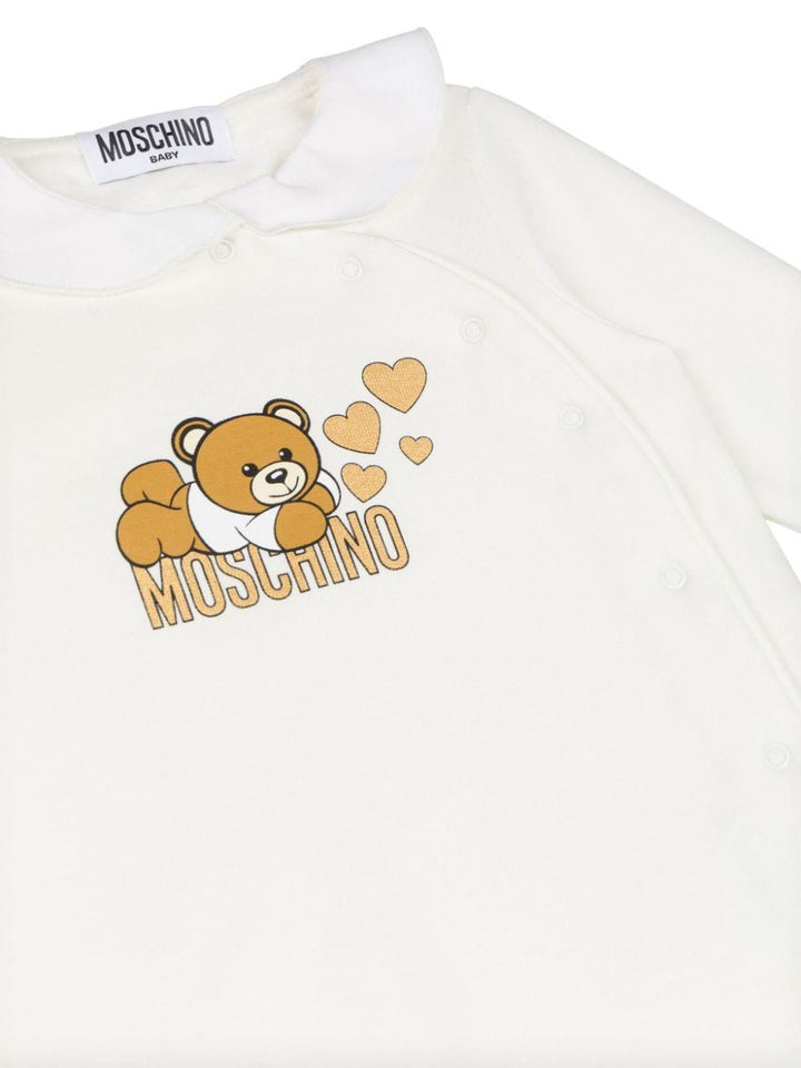 White baby onesie with logo