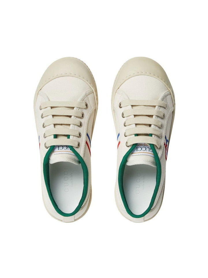 White sneakers for children with logo