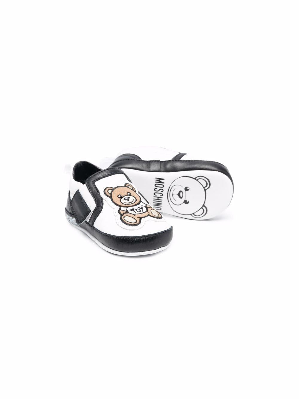 Black and white leather baby shoes