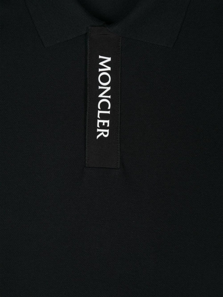 Black polo shirt for boys with logo