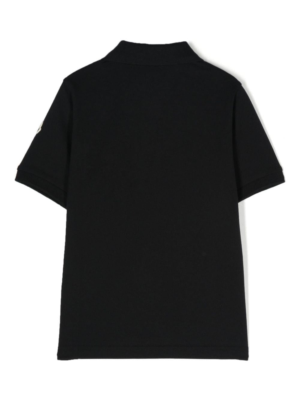 Black polo shirt for boys with logo