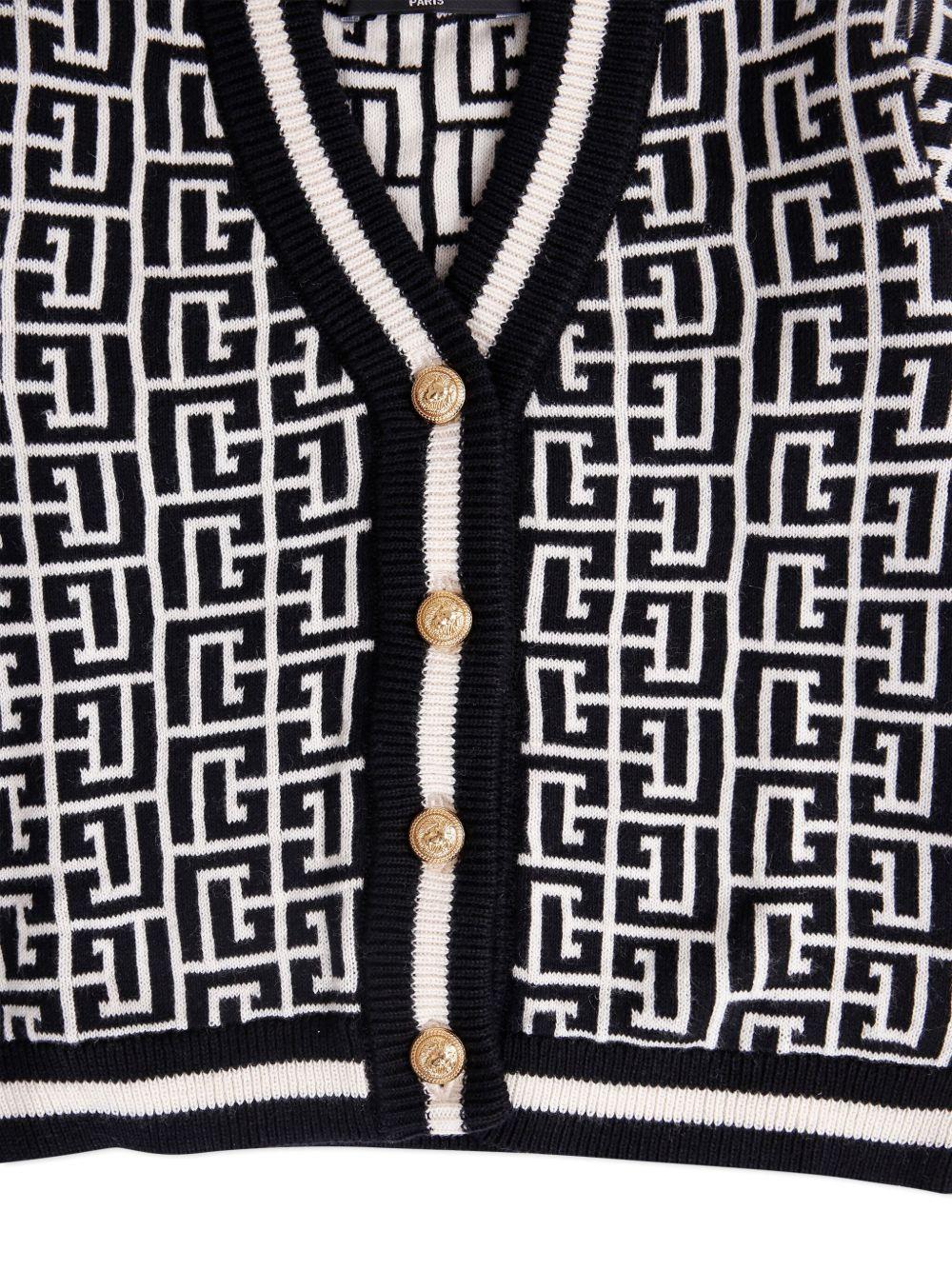 Cardigan bianco/nero per neonato