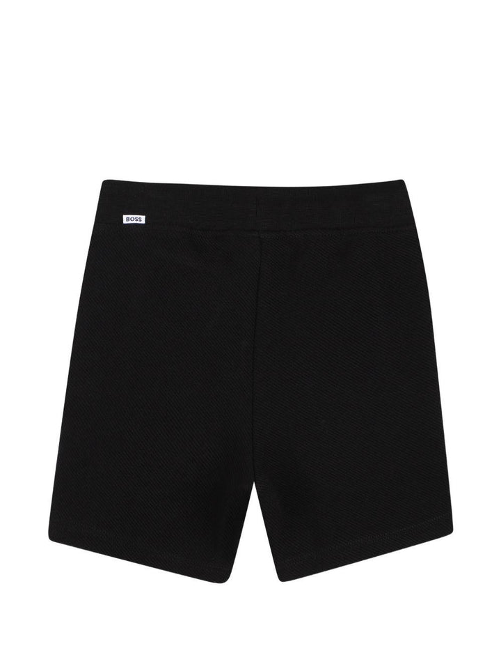 Completo bianco/nero per neonato J52846 09B Boss Kids 